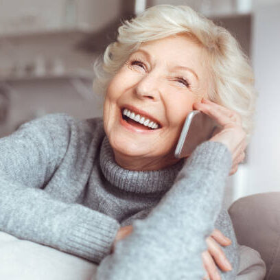 Smiling grandma on telephone
